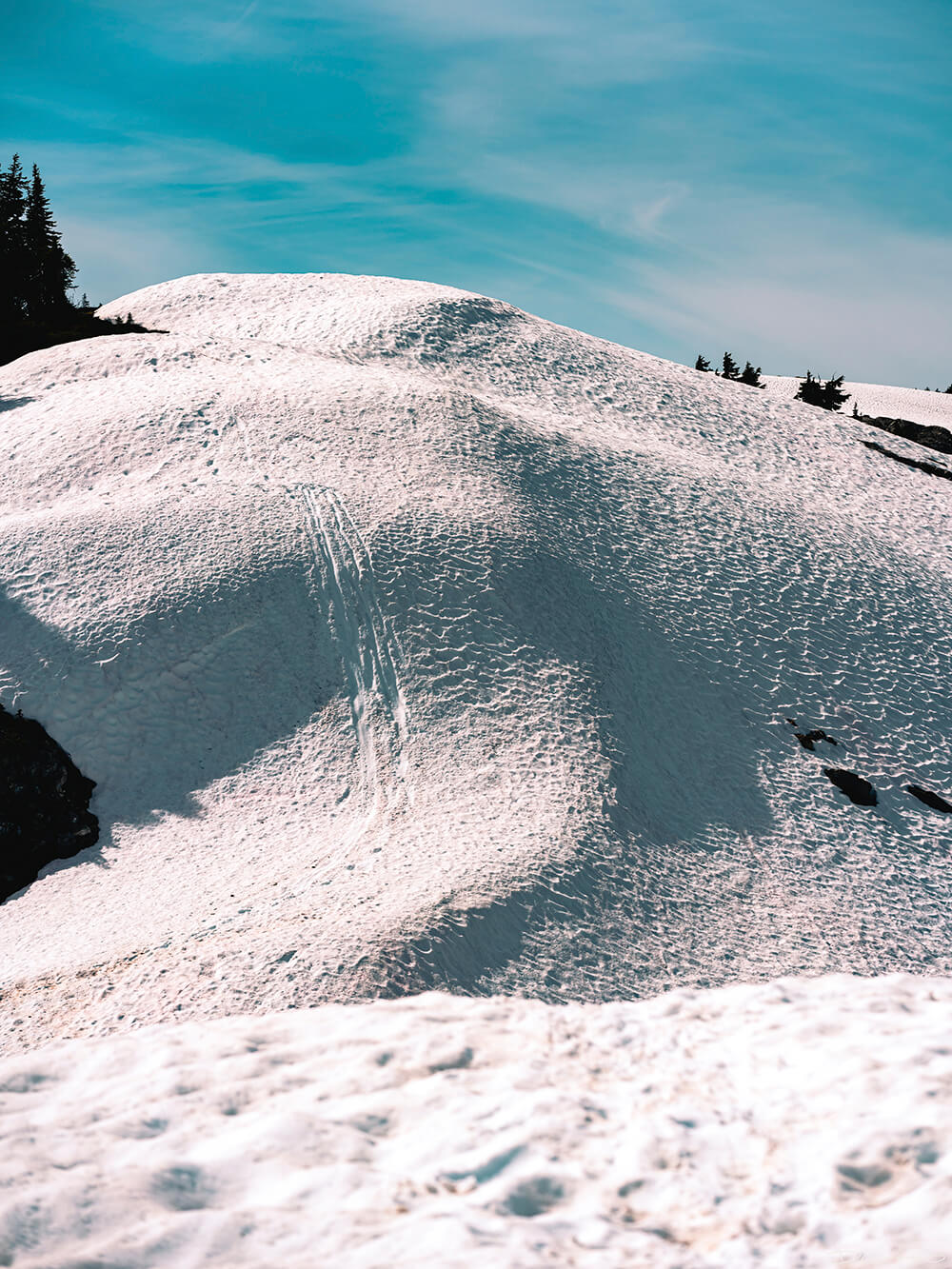 Landscape and portrait photos from a July 2020 trip to the North Cascades. Sourdough Mountain, Diablo Lake, Ross Lake and more.